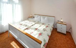 Ένα ή περισσότερα κρεβάτια σε δωμάτιο στο U8 Eg Ug