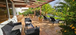 Zahrada ubytování Casa del Lago la Encantada !!!!En temporada incluye acceso piscina Las 2 columnas!!!!!