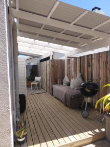 Et opholdsområde på Melkbos Sea Spray Studio Apartment