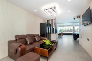 TV a/nebo společenská místnost v ubytování Villages Hồ Bơi Vũng Tàu Bãi Sau