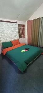 Ένα ή περισσότερα κρεβάτια σε δωμάτιο στο Juan's Mountaintop Lodge +19 φωτογραφίες