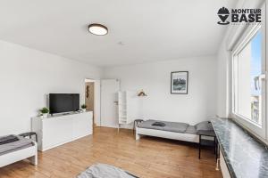 Μια τηλεόραση ή/και κέντρο ψυχαγωγίας στο MONTEUR - Unterkunft für bis zu 5 Personen in 63454 Hanau - HU12