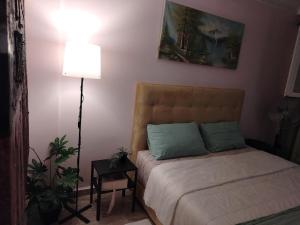 Ένα ή περισσότερα κρεβάτια σε δωμάτιο στο Appartement au centre rabat dyour jamaa