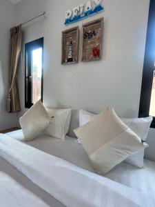 Ένα ή περισσότερα κρεβάτια σε δωμάτιο στο Nida pool villa