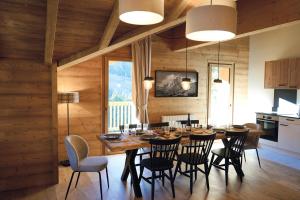 TV a/nebo společenská místnost v ubytování Résidence l'Alpeggio by My Mountain Resort