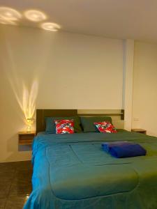 Postel nebo postele na pokoji v ubytování Palm Tree Resort