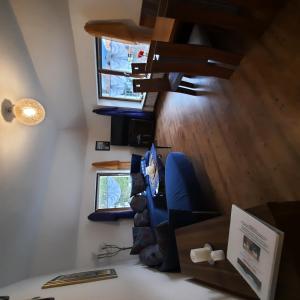 Μια τηλεόραση ή/και κέντρο ψυχαγωγίας στο Ferienwohnung Jule