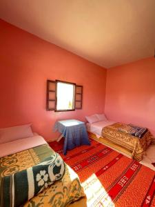 Postel nebo postele na pokoji v ubytování Hostel moha