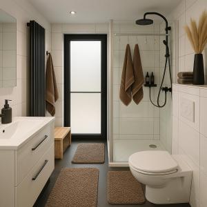 a bathroom with a shower and a toilet and a sink at Premium-Strand Chalet an der Nordsee - Noordzee - Zeeland in Breskens