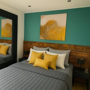 a bedroom with a large bed with yellow pillows at Premium-Strand Chalet an der Nordsee - Noordzee - Zeeland in Breskens