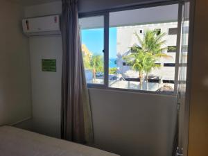 Postel nebo postele na pokoji v ubytování PRAIA DE 4 ILHAS Apartamento 2 Quartos 50M da Praia Com Vista