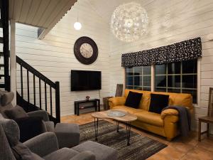 Χώρος καθιστικού στο Villa Himosputteri 2 - 8hlö, Keski-Himos +19 φωτογραφίες