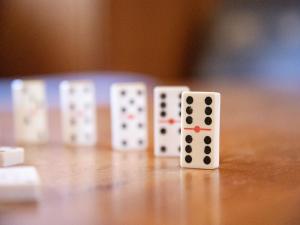 een groep dominostenen op een tafel bij Holiday Home Villa Roduit by Interhome in Le Châble