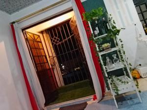 a door with a window in a room at Lovely one bedroom airbb in THIKA with WiFi ,ample parking-next to the road in Thika