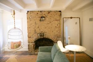 Un lugar para sentarse en Bosch House Rosé - Garden Suite