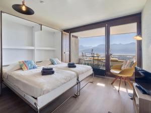 Ένα ή περισσότερα κρεβάτια σε δωμάτιο στο Studio Jeanne D'Arc Apt- A-8 by Interhome