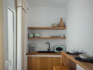 Η κουζίνα ή μικρή κουζίνα στο Amazing views in mykonos