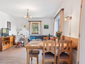 a dining room and living room with a table and chairs at Holiday Home Kralovice by Interhome in Nebahovy +63 photos
