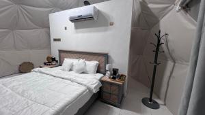 Ένα ή περισσότερα κρεβάτια σε δωμάτιο στο قبة سماء جبل شمس - qubat sama jabal shams