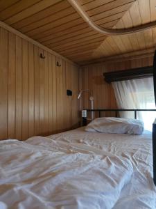 Postel nebo postele na pokoji v ubytování My Hostel with Palm + 36 fotografií