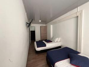 Ένα ή περισσότερα κρεβάτια σε δωμάτιο στο Casa Hotel Atelier +15 φωτογραφίες