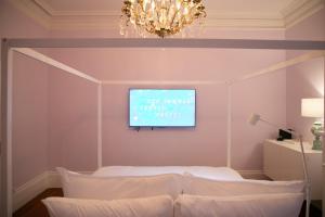 Ένα ή περισσότερα κρεβάτια σε δωμάτιο στο Bosch House Rosé - Lila Suite