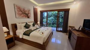 Postel nebo postele na pokoji v ubytování Asna House