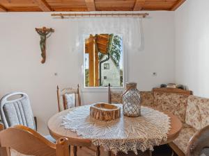 a table with a vase on it in a living room at Holiday Home Fish & Boat by Interhome in Hurka +33 photos