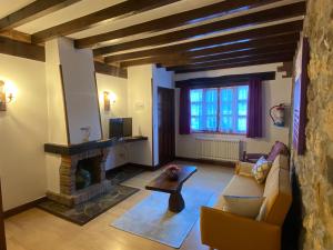 Μια τηλεόραση ή/και κέντρο ψυχαγωγίας στο Hotel Rural Rumoroso