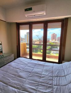 En eller flere senge i et værelse på Arpón