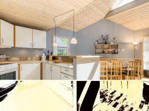 a kitchen with white cabinets and a dining room at Holiday Home Hristijan - 4-8km from the sea by Interhome in Læsø