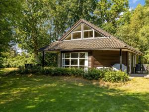 a house with a large yard in front of it at Holiday Home Hristijan - 4-8km from the sea by Interhome in Læsø +18 photos