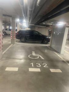 a car is parked in a parking garage at Apartmán P121 in Trnava