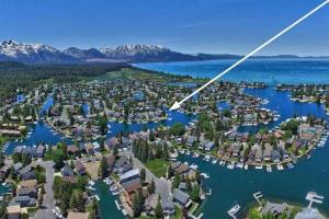 an aerial view of a resort on a lake at 2030 Marconi Way home in South Lake Tahoe