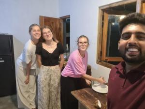 a group of three women standing next to a man at The Hideaway in Kurunegala