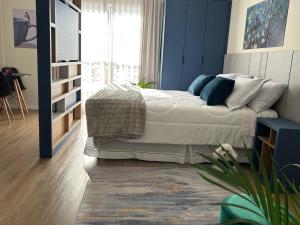 Postel nebo postele na pokoji v ubytování BetaSuites