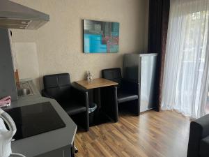 Posezení v ubytování Appartement am Löhner Bahnhof