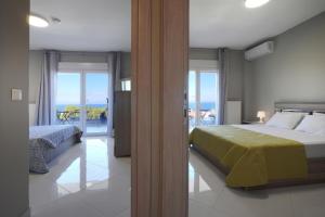 Ένα ή περισσότερα κρεβάτια σε δωμάτιο στο Sun & Splash Villa by Golden Host +15 φωτογραφίες