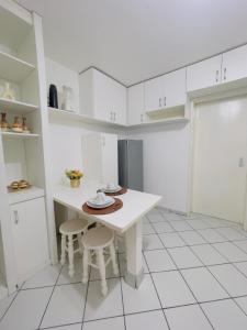 Η κουζίνα ή μικρή κουζίνα στο Downton · Loft | 1/4 Aconchegante com Ar e Garagem +10 φωτογραφίες