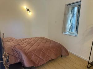 Ένα ή περισσότερα κρεβάτια σε δωμάτιο στο B&Borrelli La Dimora dell Artista