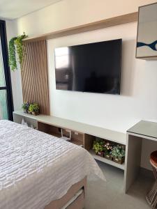 Et tv og/eller underholdning på Beach Class Summer Residence