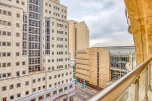 a view from a balcony of buildings in a city at Micheal Angelo towers in Johannesburg