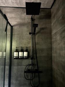 Ένα μπάνιο στο Brīvdienu māja Tumškalni