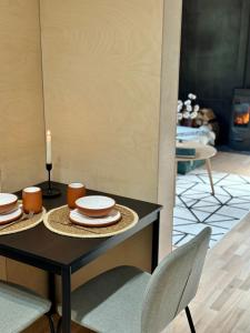 Χώρος καθιστικού στο Brīvdienu māja Tumškalni