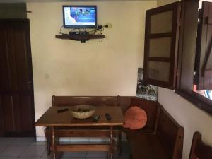 TV a/nebo společenská místnost v ubytování Appartement cosy au bord de la mer, 30 m², 2 pers.