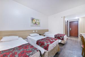Postel nebo postele na pokoji v ubytování Hotel Nacional Inn Campinas Trevo