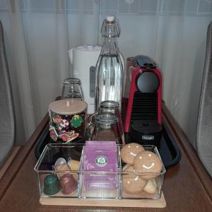 a drawer filled with food and a blender on a table at Casa Paul in Craiova