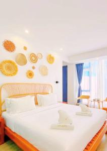 Ένα ή περισσότερα κρεβάτια σε δωμάτιο στο Fun Hotel