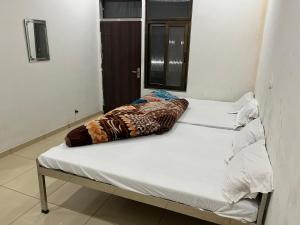 Ένα ή περισσότερα κρεβάτια σε δωμάτιο στο Hotel Shiv Mahima +17 φωτογραφίες