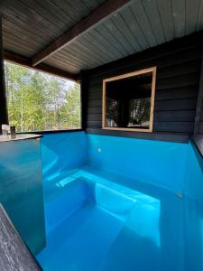 Bazén v ubytování Alaska Glamping Linnansaari nebo v jeho okolí